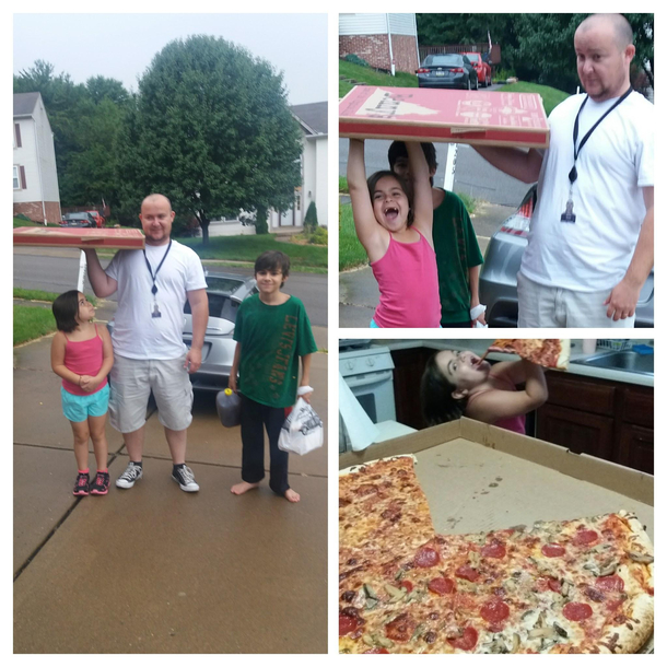 Heres another look at my daughter and her giant pizza