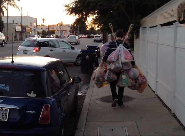 Hes determined to take all those groceries in one triplike really determined