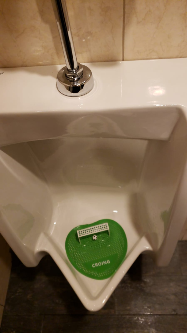 Husband sent this pic from a sports bar restroom in NYC - he also pointed out that the soccer ball bobbles as you pee on it