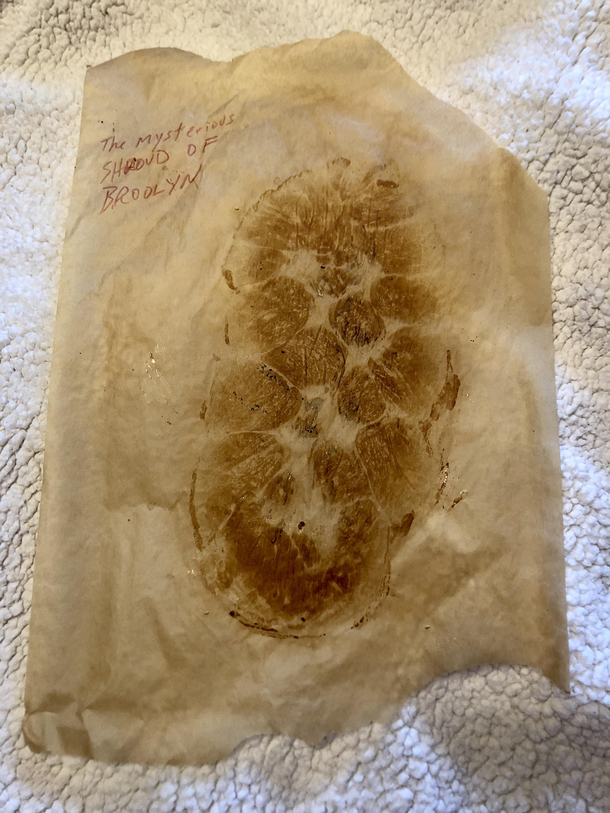 I baked a Challah and it stained the parchment paper My dad wrote a caption on it
