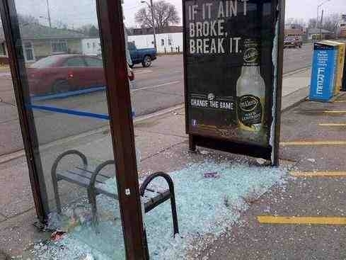 I blame the advertisement for what happened to this bus shelter