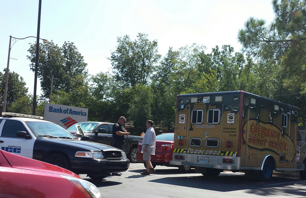 I cant believe I actually got a picture of the cops pulling over the Emergency Donut Vehicle