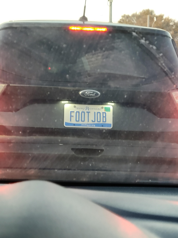 I cant tell if the guy in front of me is a podiatrist or just likes to advertise his fetishes
