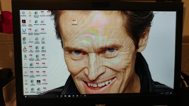 I changed my bosses desktop background without him knowing