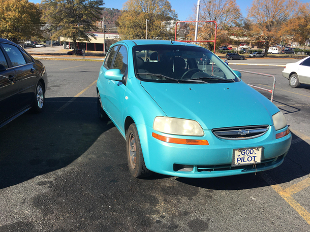 I guess God also makes you park like a jerk