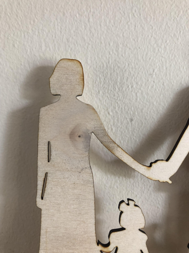 I made a wedding cake topper and then saw a knot in the wood at the worst place 