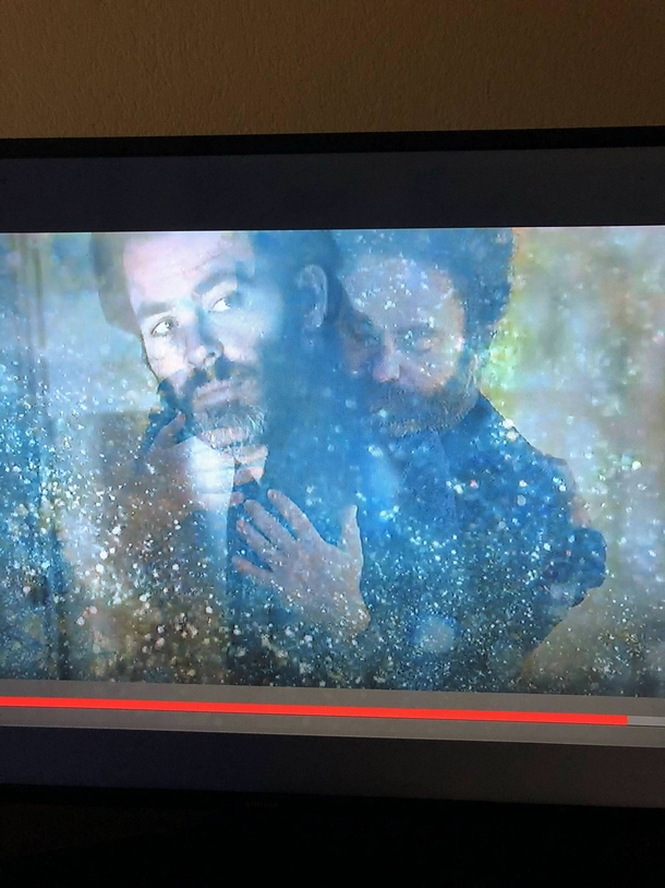 I paused the credits of A Wrinkle In Time and was rewarded with this image of Zach Galifianakis tenderly embracing Chris Pine