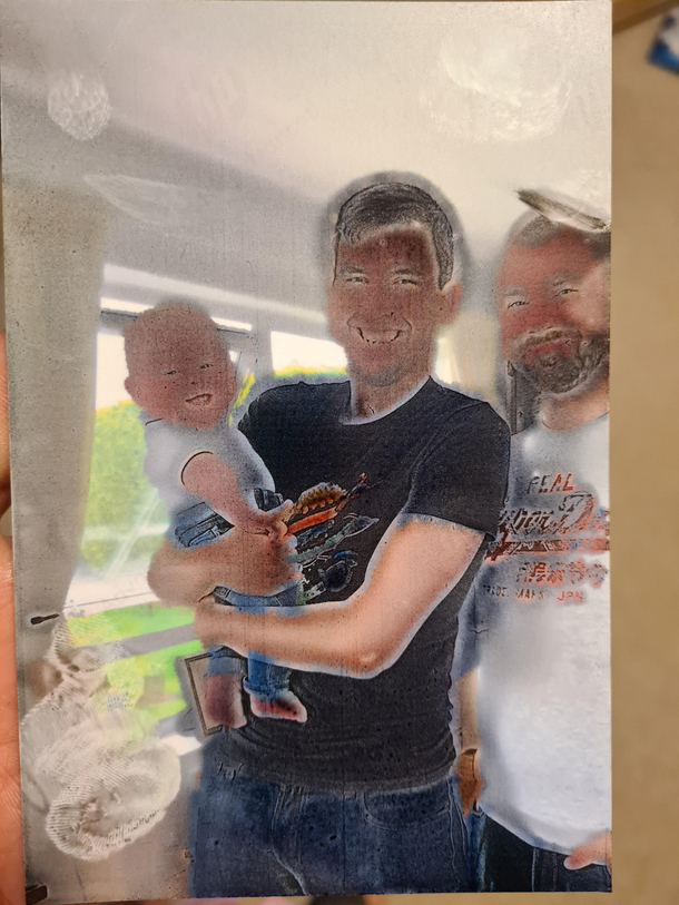 I put the photo paper in the wrong way around and the result was very cursed