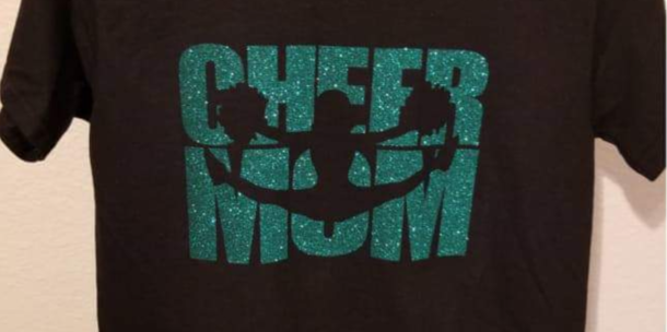 I think a solid oval would get the point across without the questionable addition the O makes to the cheerleader