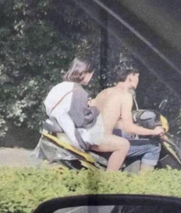 I thought a naked mannequin was sitting between them