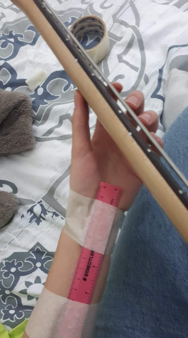 I told my student to keep her wrist straight while playing BassGuitar  and thats what she came up with I cant say im not impressed