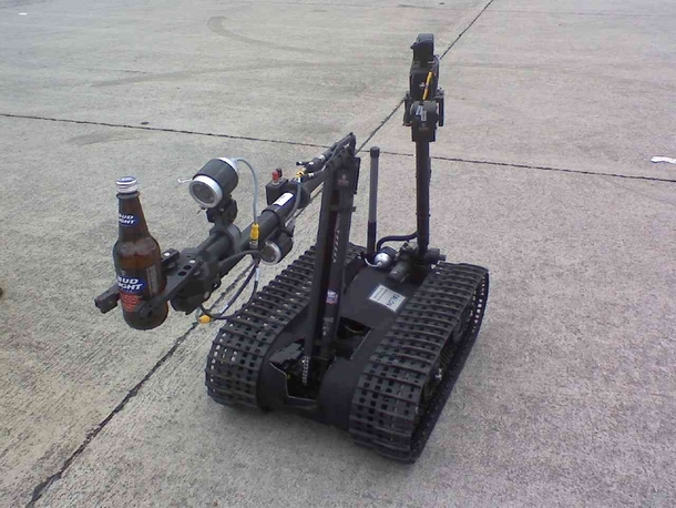 I was working a beer stand at an air show in Tennessee a few years ago when this Navy EOD robot randomly showed up with  in its gripper sooo