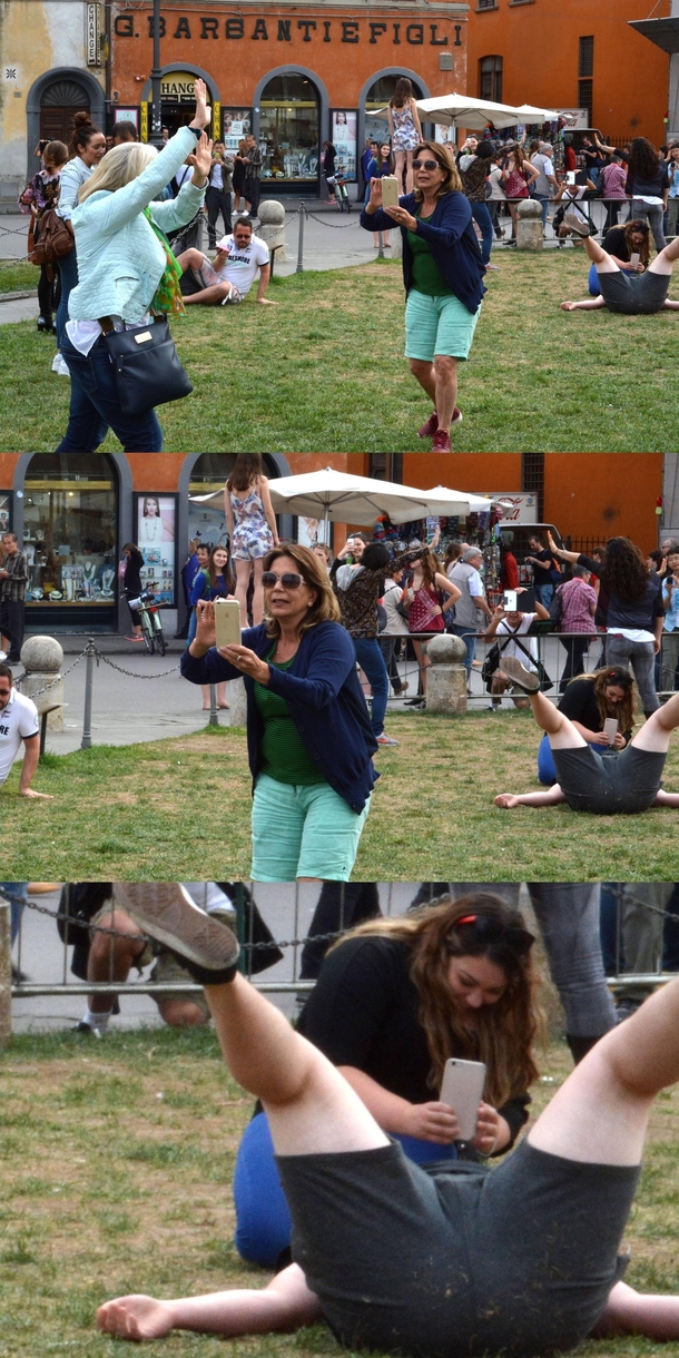 I went to Pisa to look at a tower The people taking pictures of it were more interesting though