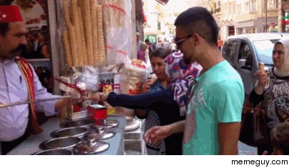 Ice cream vendor trolling a customer