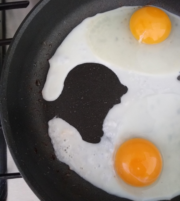 If you look at the gap in between the two eggs it looks like a bald man yelling