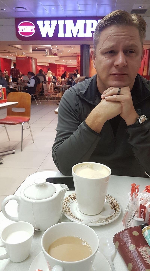 Im a super nervous flyer My wife just took this pic of me at the airport restaurant about to board the plane a part of our honeymoon