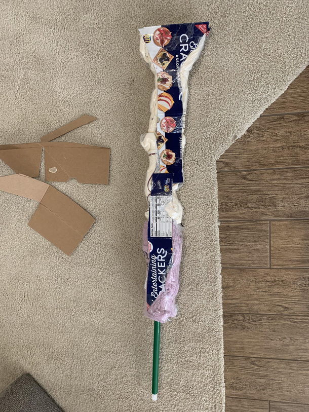 Im wrapping the clothes I got my wife so that she thinks I got her a gun