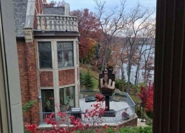 In  a man brought a house next to his ex-wife just so he could install this huge middle finger that she can see from her window 