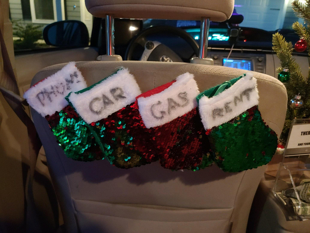 In the back of my Lyft drivers car Merry Christmas