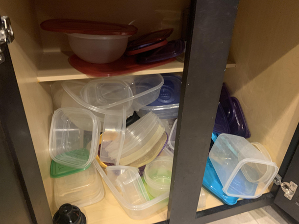 Is it a law of nature that every Tupperware cabinet must look like this