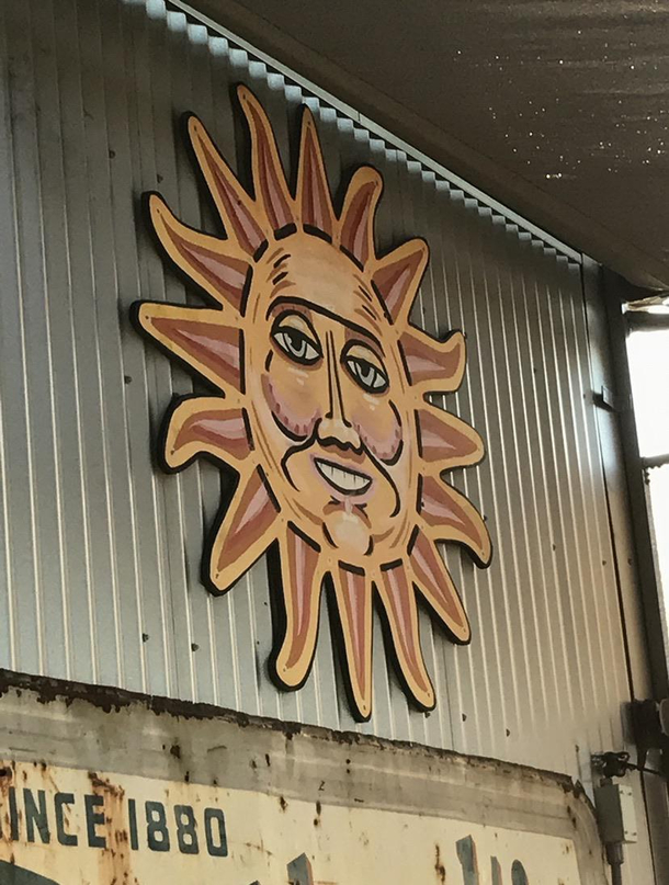 Is it me or does this sun decoration look like its about to steal the Declaration of Independence