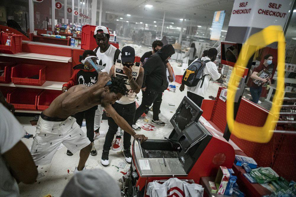 Is the white dude on the right looting LEGOs