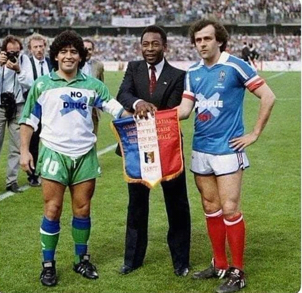 It is year  Maradona is wearing no drugs shirt Platini is wearing no corruption Time flies