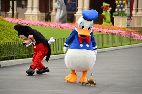 Its my cake day but I had nothing prepared so heres a picture of Donald with his adoptive family at Disneyland