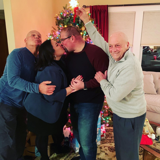 Its our first married Christmas and we were trying to take a cute photo by the tree My dad and great uncle just doing their jobs