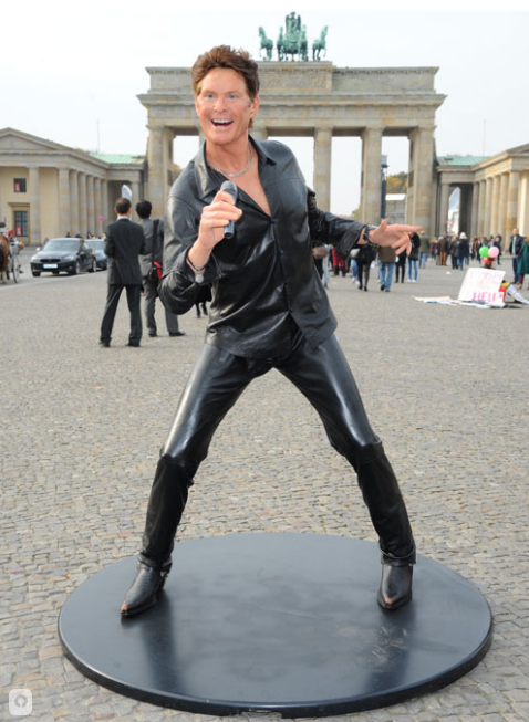 Its the  anniversary of the Fall of the Berlin Wall in Germany and to help celebrate they placed a life sized wax statue of the Hoff in front of the Brandenburg Gate