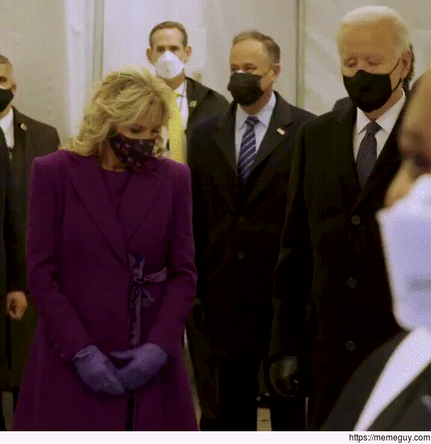 Joe and Jill Biden holding hands