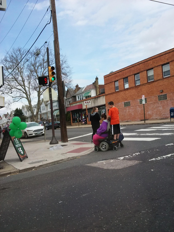 Just a kid riding his grandma around town