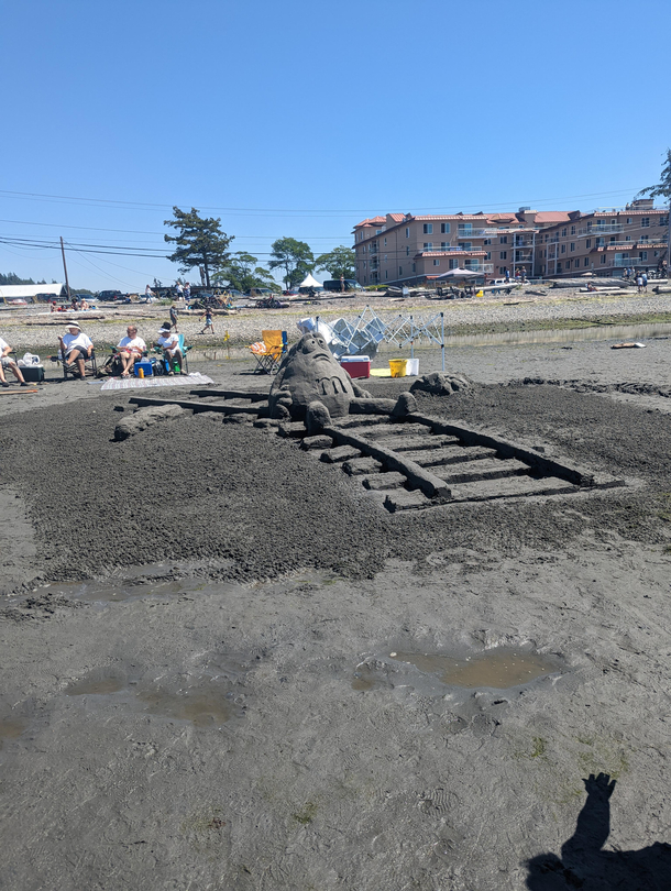 just a very cool sand sculpture thats not morbid at all that I saw at my local sand castle competition today