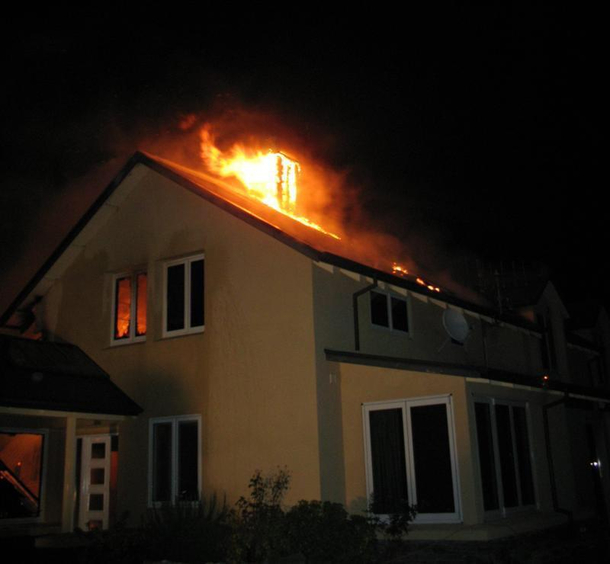 Just came home from a party Moons reflection makes it look like my house is on fire