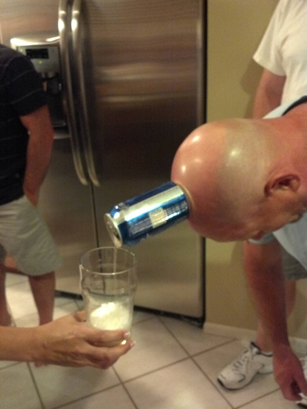 Just my dad pouring a beer off the top of his head