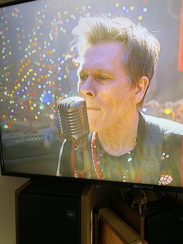 Kevin bacon apparently can sing into a backwards microphone with no negative results