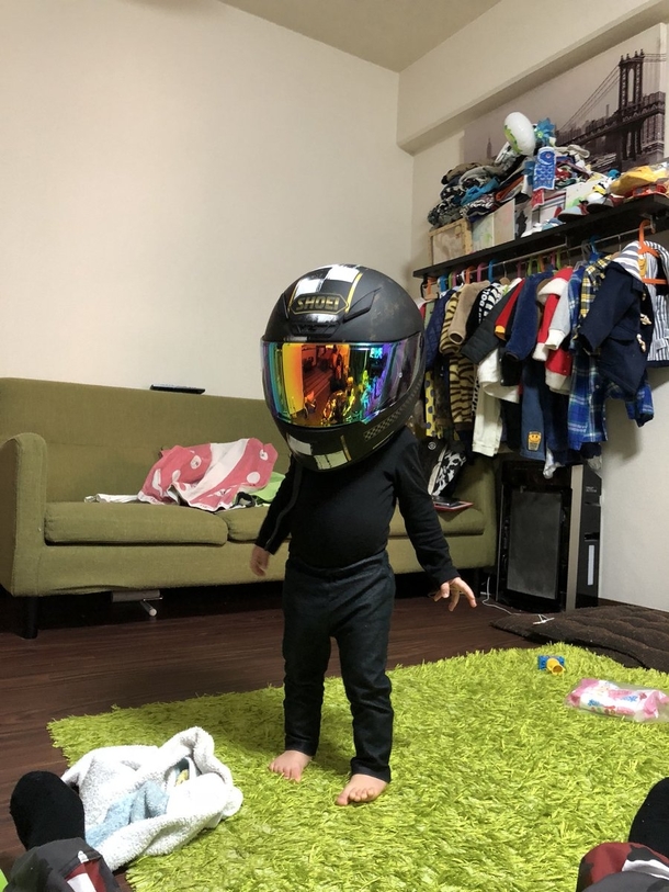 Kid found the helmet