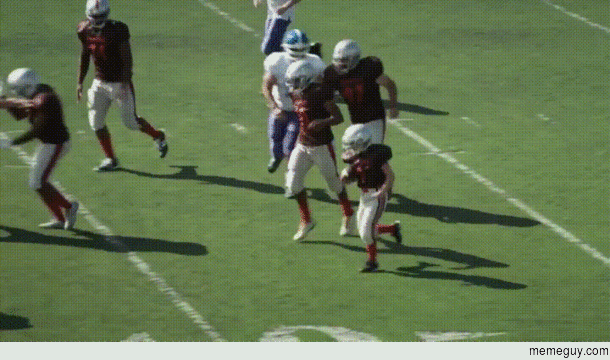Kid goes for the touchdown