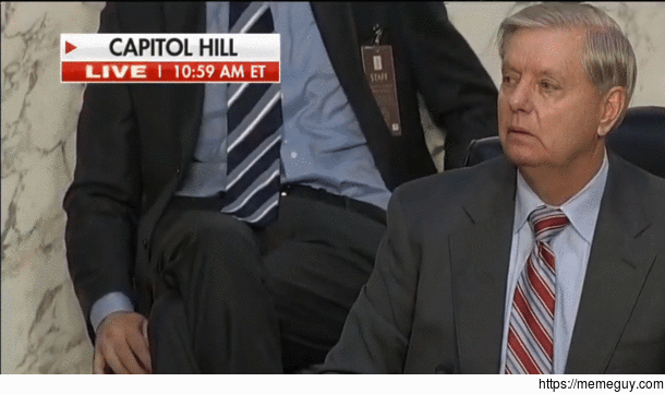 Lindsay Graham winks after Republicans win vote to forge ahead with SCOTUS nomination