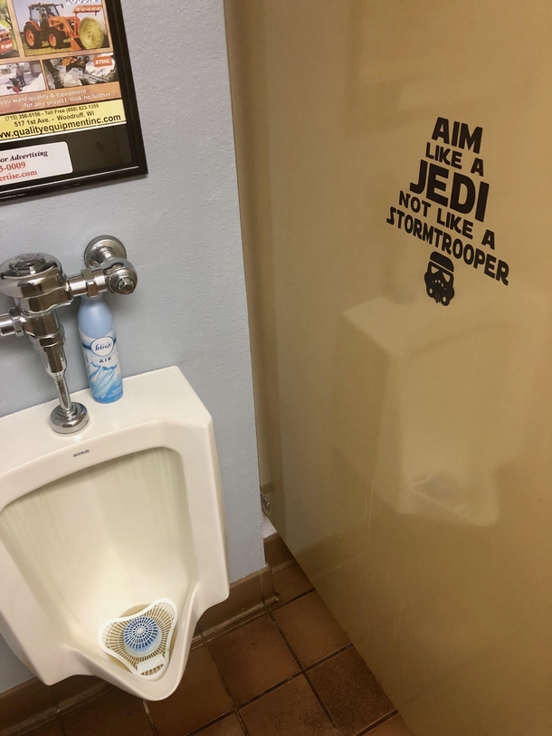 Located next to the urinal