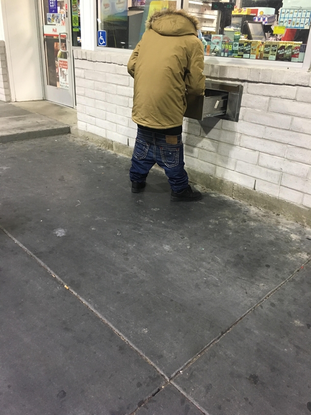 Looks like kids in a Totem Pole Trench Coat trying to buy alcohol