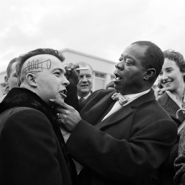 Louis Armstrong draws a trumpet on the head of a French punk Time Traveling Elon Musk 