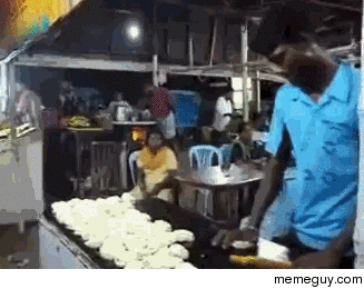 Making chapati bread in India
