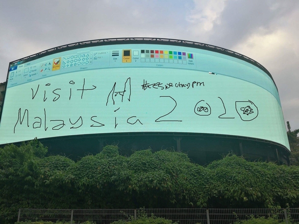 Malaysian Times Square Massive Screen got hacked to become a meme canvas