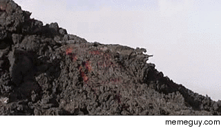 Man runs up lava flow