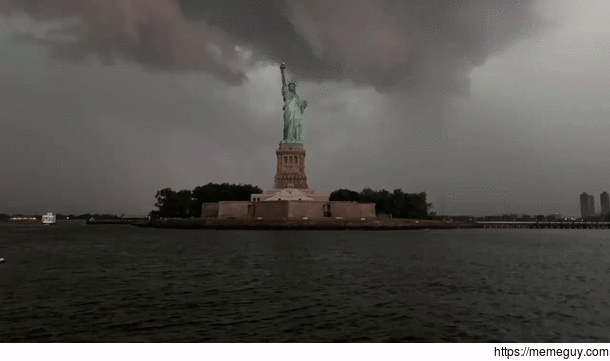 massive lightning strike on liberty island captured by Mikey Cee