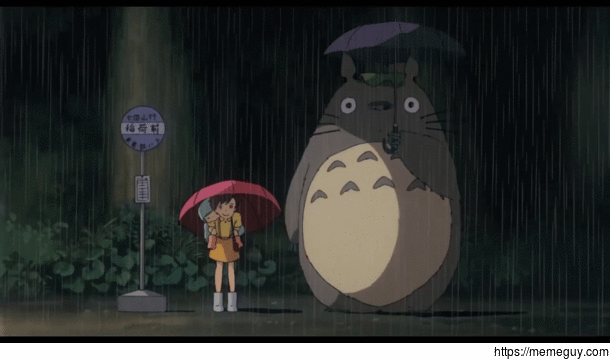 Mei Satsuki and Totoro waiting at a bus stop during a rainy night