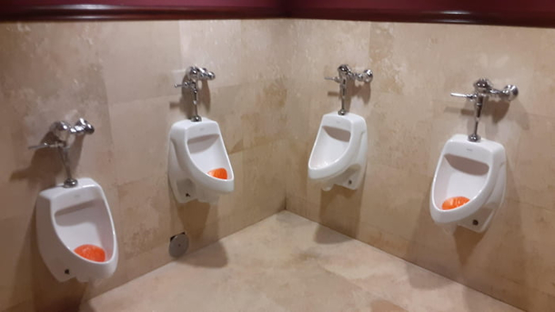 Mens bathroom in a local theater