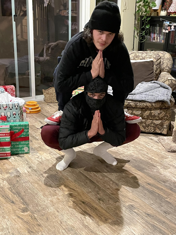Merry Christmas Heres my brother and Is Christmas pose