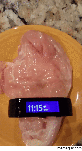 Microsoft Smart watch registering a bpm pulse on a piece of chicken filet